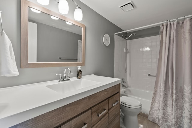 full bath featuring vanity, shower / bath combination with curtain, toilet, and visible vents