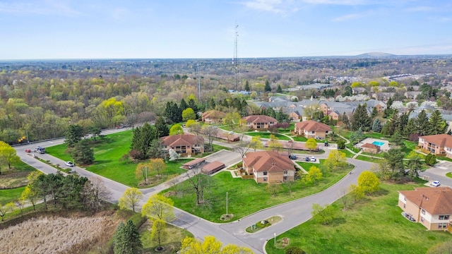 birds eye view of property with a residential view