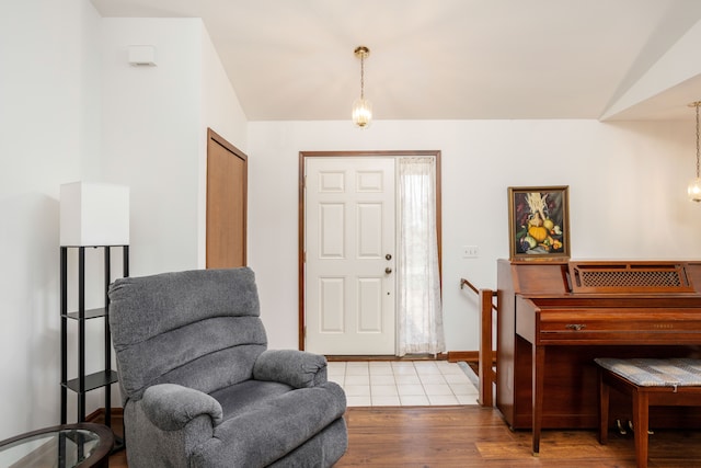 foyer entrance featuring wood finished floors