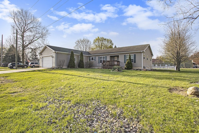 17026 H Dr S, Marshall, MI 49068 - ranch-style home with an attached garage, a front yard, concrete driveway, and a deck