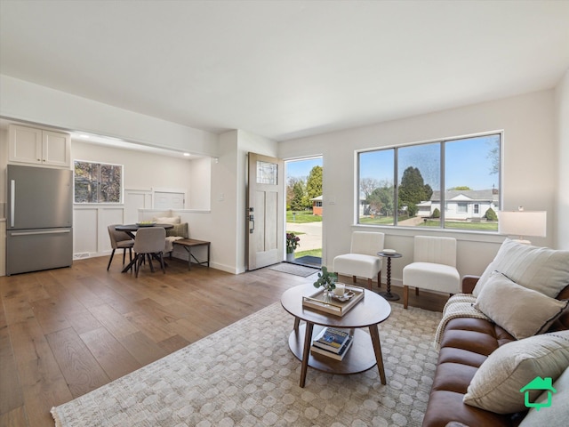 living area featuring light wood-style flooring