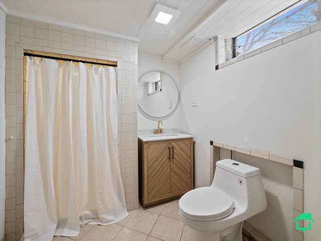 bathroom featuring a shower with curtain, toilet, tile patterned flooring, and vanity