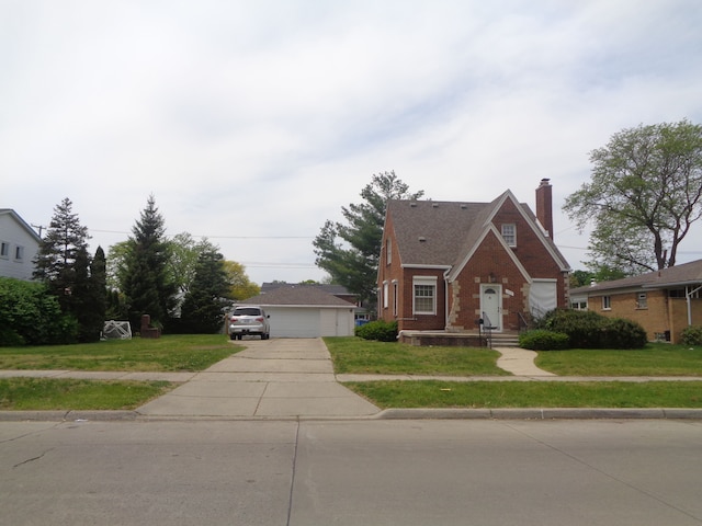 1353 N Gulley Rd, Dearborn Heights, MI 48127 - english style home featuring brick siding, a front yard, and a chimney