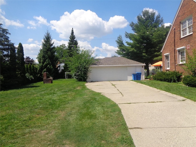 1353 N Gulley Rd, Dearborn Heights, MI 48127 - exterior space with an outdoor structure, a detached garage, and a front yard