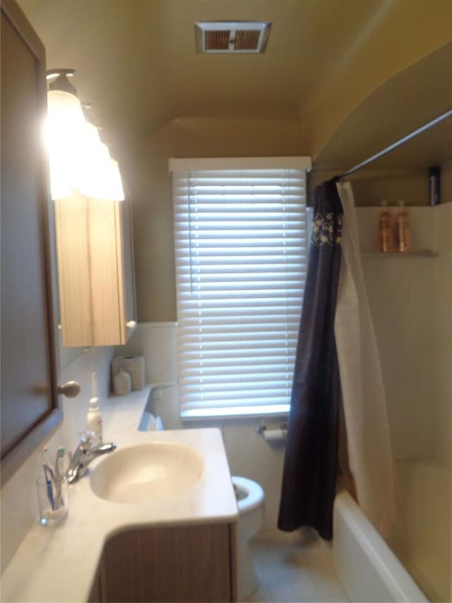 1353 N Gulley Rd, Dearborn Heights, MI 48127 - full bath featuring visible vents, toilet, vanity, and a wealth of natural light