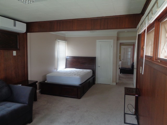 1353 N Gulley Rd, Dearborn Heights, MI 48127 - bedroom with a wall mounted AC, wood walls, and light colored carpet