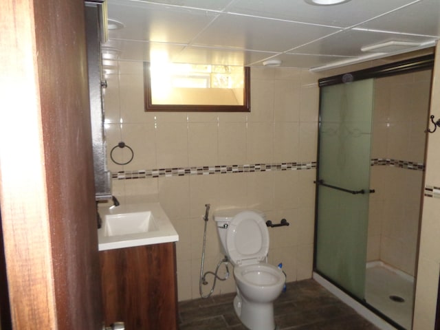 1353 N Gulley Rd, Dearborn Heights, MI 48127 - full bath with toilet, tile walls, vanity, and a stall shower