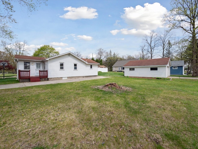 view of yard featuring a deck