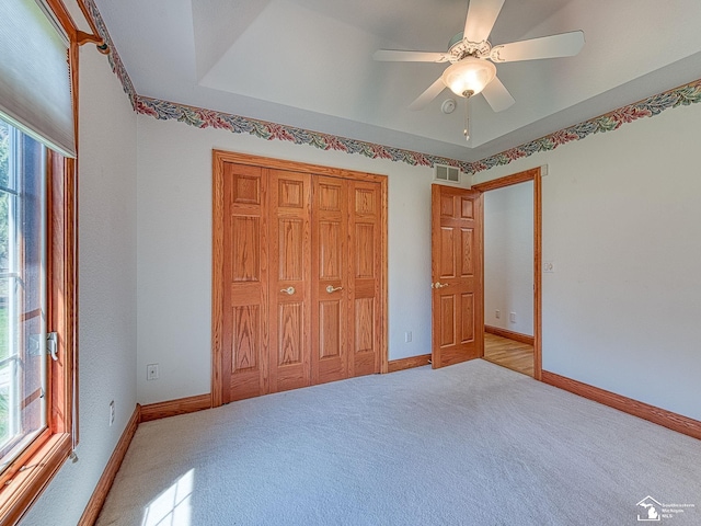 3158 Lennox Ct, Lambertville, MI 48144 - unfurnished bedroom featuring carpet, baseboards, a closet, and a ceiling fan
