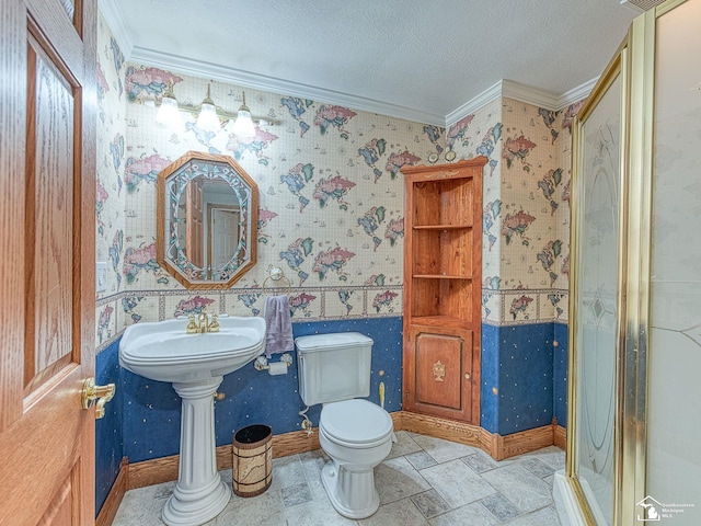3158 Lennox Ct, Lambertville, MI 48144 - bathroom with crown molding, a textured ceiling, toilet, wallpapered walls, and stone finish flooring