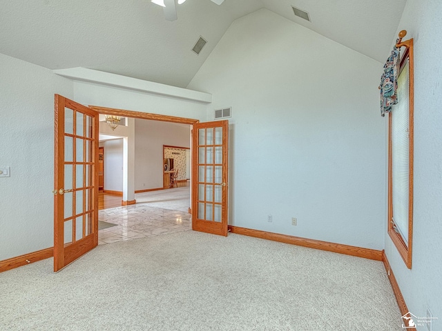 3158 Lennox Ct, Lambertville, MI 48144 - spare room with french doors, carpet, baseboards, and high vaulted ceiling