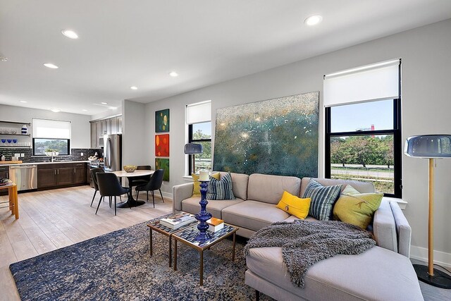 1737 Merrick St # 12, Detroit, MI 48208 - living area featuring recessed lighting, light wood-style flooring, and baseboards