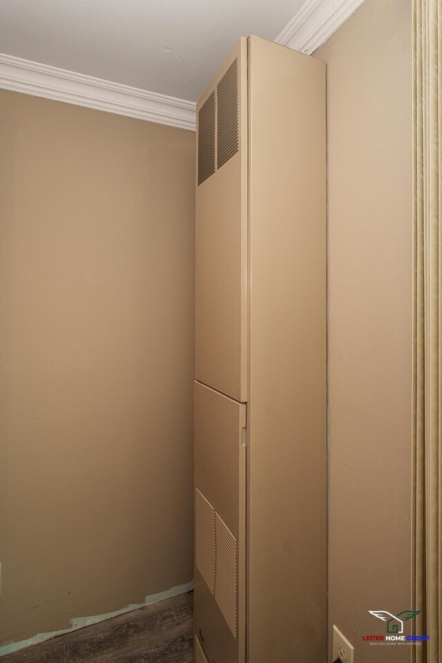 closet featuring a heating unit