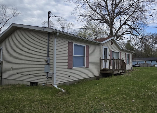 2401 Schippers Ln, Kalamazoo, MI 49048 - view of side of home with a yard