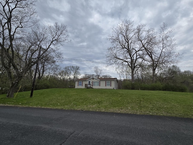 2401 Schippers Ln, Kalamazoo, MI 49048 - view of front facade with a front lawn