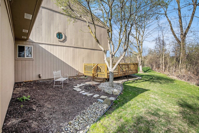 view of yard featuring a deck