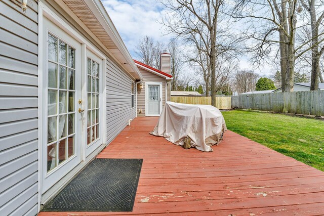 110 Dayton St, Homer, MI 49245 - deck with a yard, french doors, and a fenced backyard