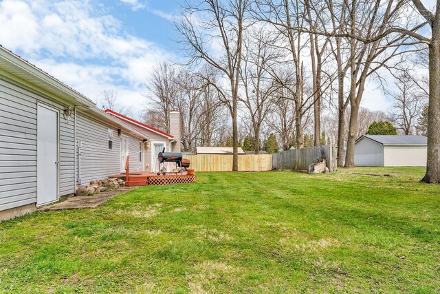 110 Dayton St, Homer, MI 49245 - view of yard with fence and a deck