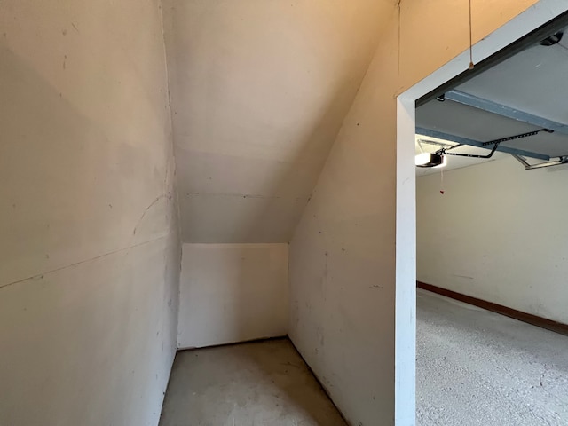 additional living space with vaulted ceiling