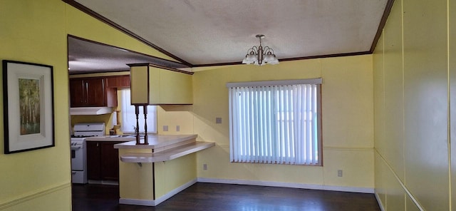 kitchen with a textured ceiling, an inviting chandelier, light countertops, under cabinet range hood, and white gas range
