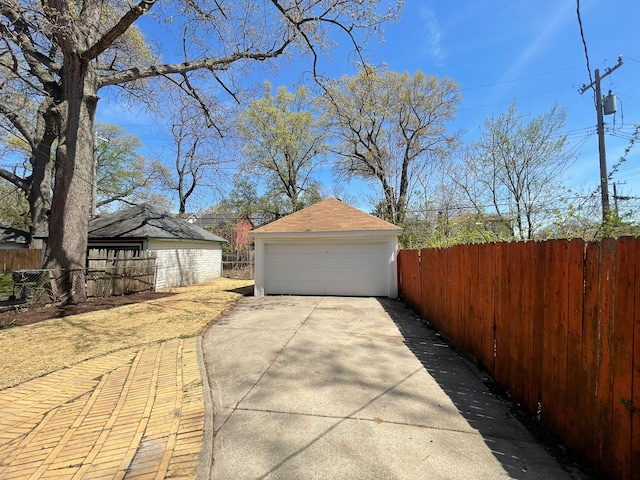 detached garage with fence