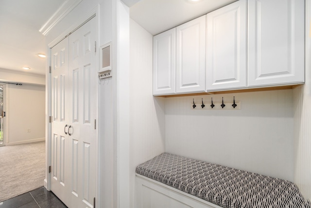 mudroom with recessed lighting and dark colored carpet