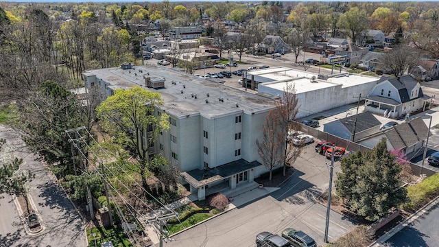 birds eye view of property with a residential view