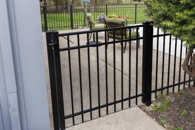 11630 Mcclumpha Rd, Plymouth, MI 48170 - view of gate featuring fence