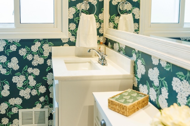 11630 Mcclumpha Rd, Plymouth, MI 48170 - bathroom with visible vents, wallpapered walls, and vanity
