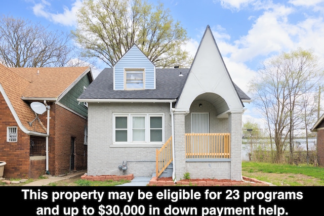 15100 Washburn St, Detroit, MI 48238 - view of front of home with roof with shingles and brick siding