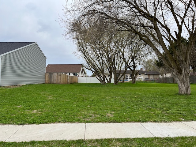 view of yard with fence