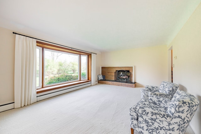 carpeted living area with a fireplace