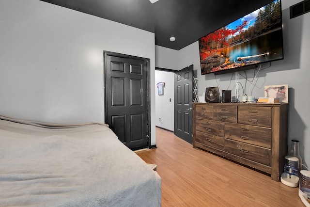 bedroom featuring light wood-type flooring