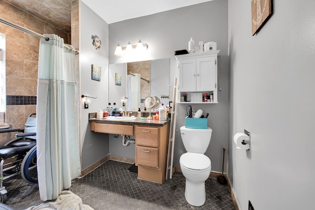 bathroom with vanity, tile patterned floors, a shower with curtain, and toilet