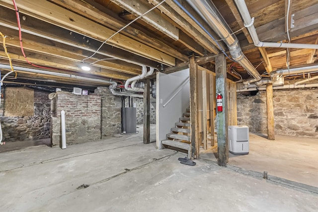 unfinished basement with stairs