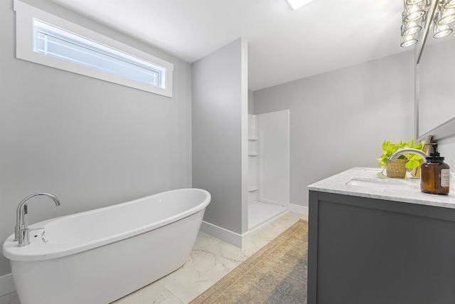 full bathroom featuring baseboards, a shower stall, marble finish floor, vanity, and a soaking tub