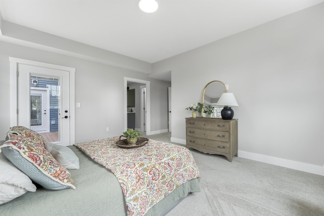 bedroom with light colored carpet, access to outside, and baseboards