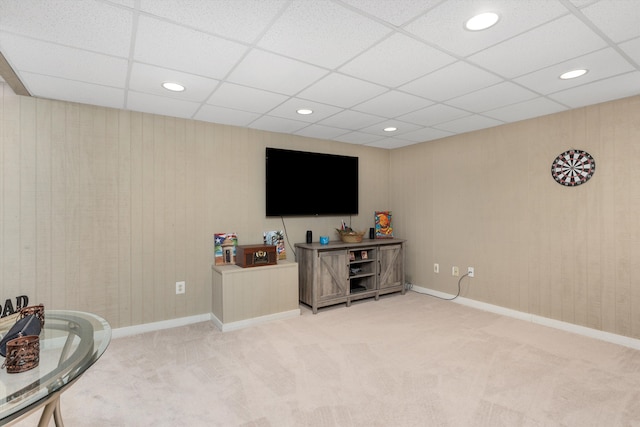 sitting room featuring light carpet, a paneled ceiling, recessed lighting, and baseboards