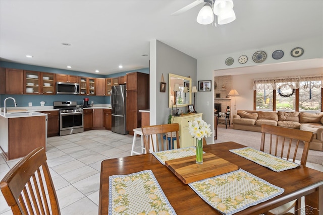 dining area with recessed lighting, light tile patterned floors, and a ceiling fan