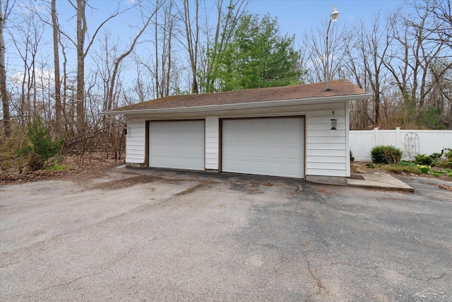 detached garage with fence