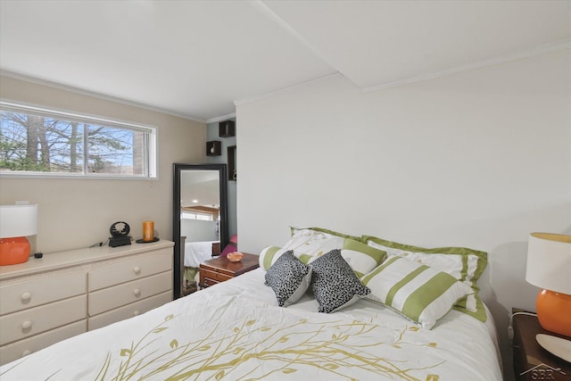 bedroom featuring crown molding