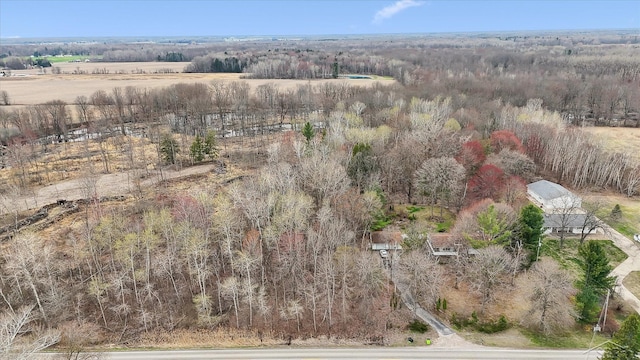 aerial view with a wooded view