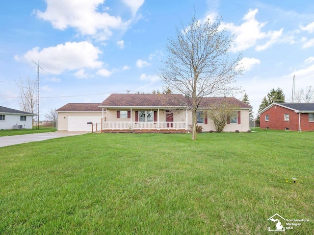 single story home featuring a garage, driveway, and a front yard