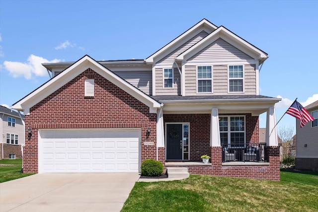 view of front of property with an attached garage, brick siding, a front yard, concrete driveway, and covered porch