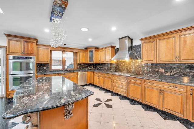 kitchen featuring recessed lighting, brown cabinetry, tasteful backsplash, wall chimney range hood, and appliances with stainless steel finishes