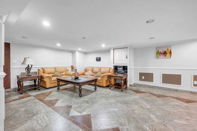 living room featuring ornamental molding and recessed lighting