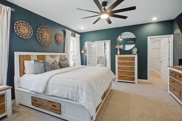 bedroom with baseboards, a ceiling fan, light carpet, and recessed lighting