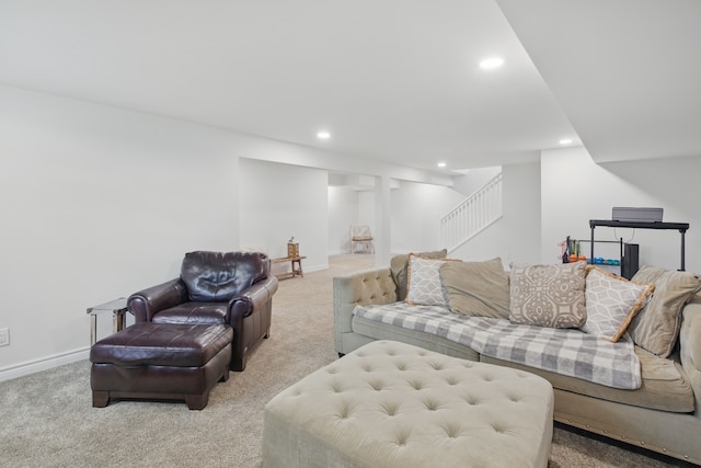 living room with baseboards, recessed lighting, stairs, and carpet flooring