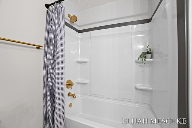 full bathroom with shower / tub combo