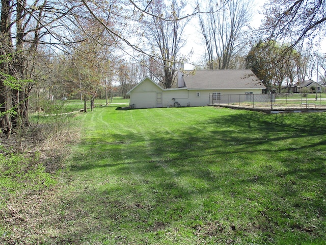 view of yard featuring fence